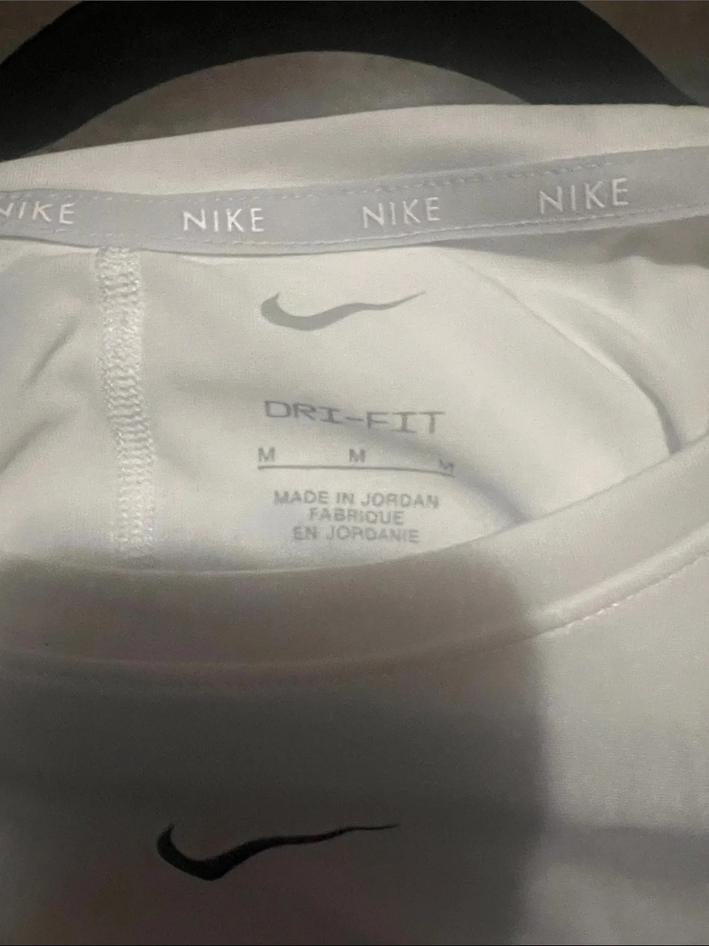 Nike White Short Sleeve T-Shirt with Black Swoosh